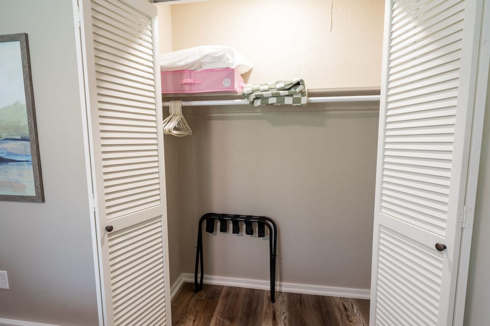 Green bedroom closet.