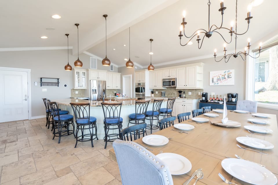 Large Kitchen that will seat 20 while overlooking the main lake.