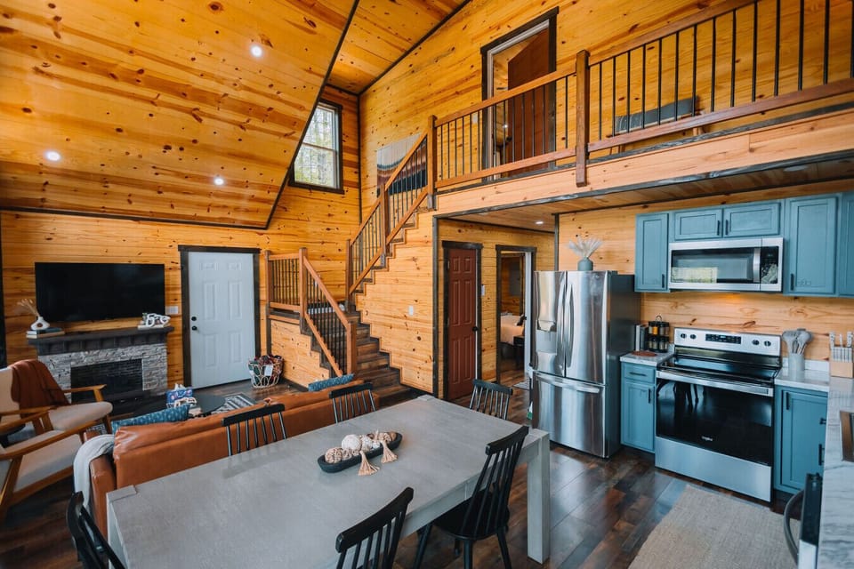 The perfect gathering space with an open living room & fully stocked kitchen