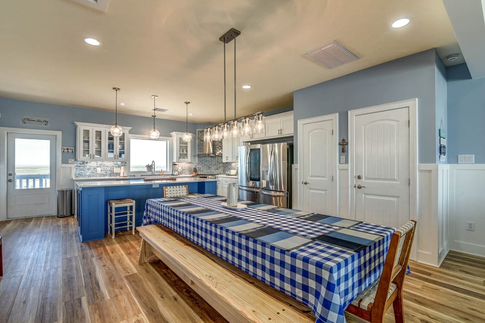 Dinning Area has a custom built Trestle Table that seats 12