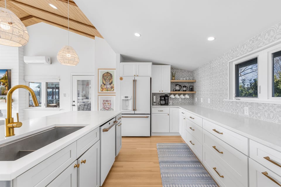 Brand new luxury white & brass appliances.