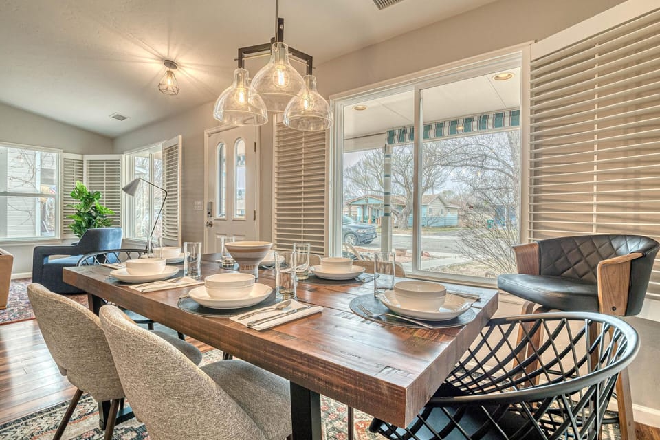 Gather round, it's time to share good food and great company in this cozy dining room.