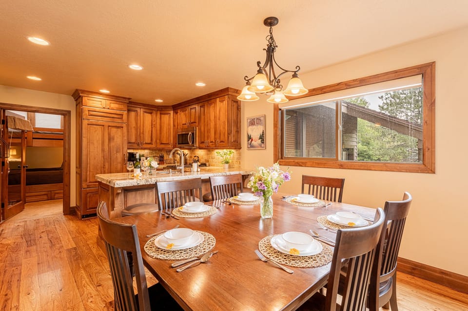 Dining table expands with additional chairs for seating up to 10