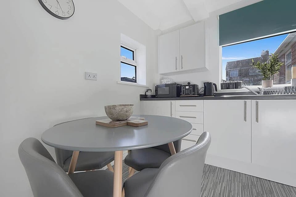 4-seater dining table for cosy gatherings and memorable meals.