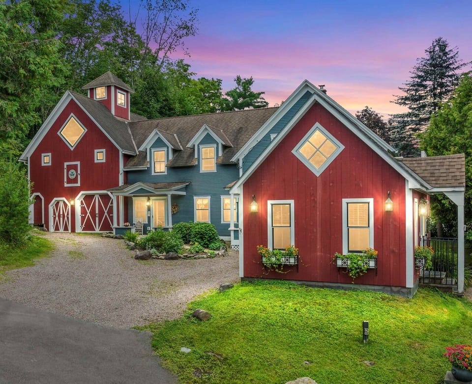 Main house is behind the carriage house, Carriage has has own parking and is totally stand alone, no walls are shared