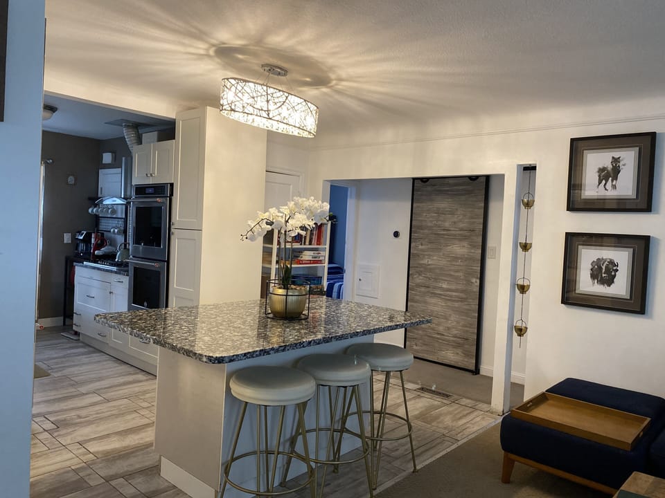 Island dining room, soft bar stools. 