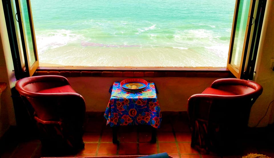 Our favorite seats in the condo. Enjoy morning coffee and evening cocktails here