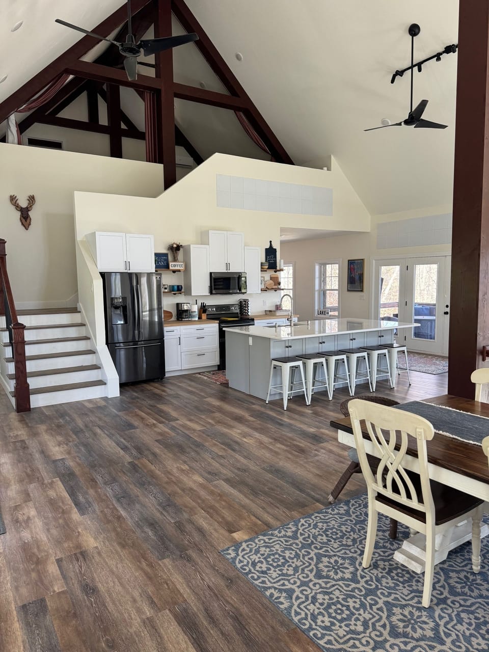 Large open main level with view of loft