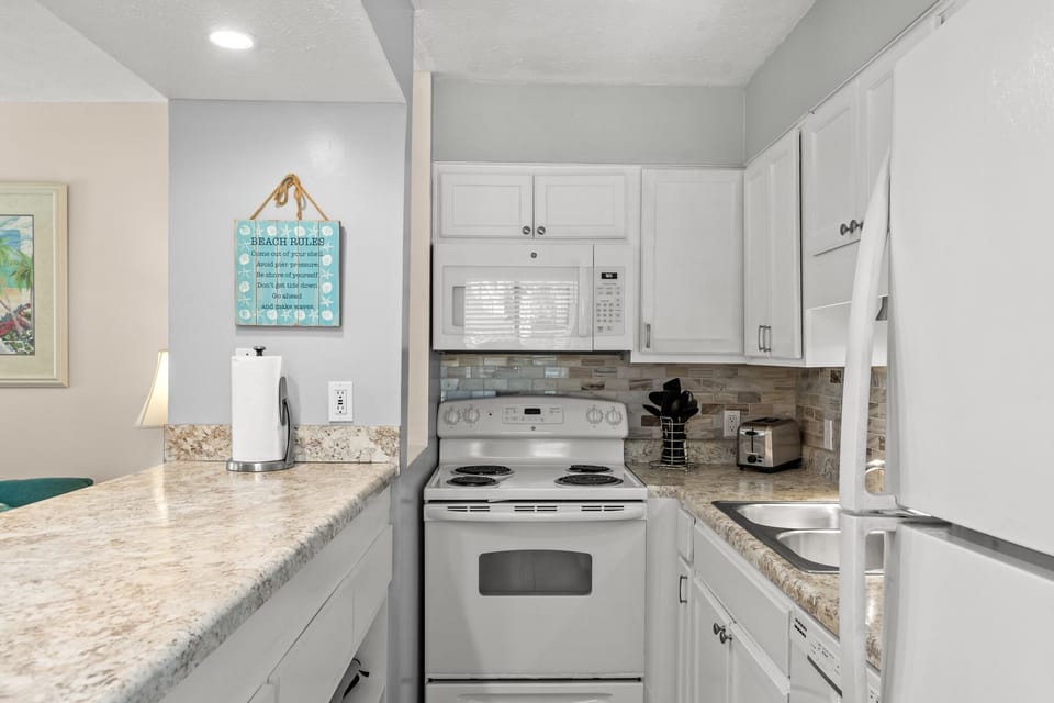 Well stocked kitchen with all you need.
