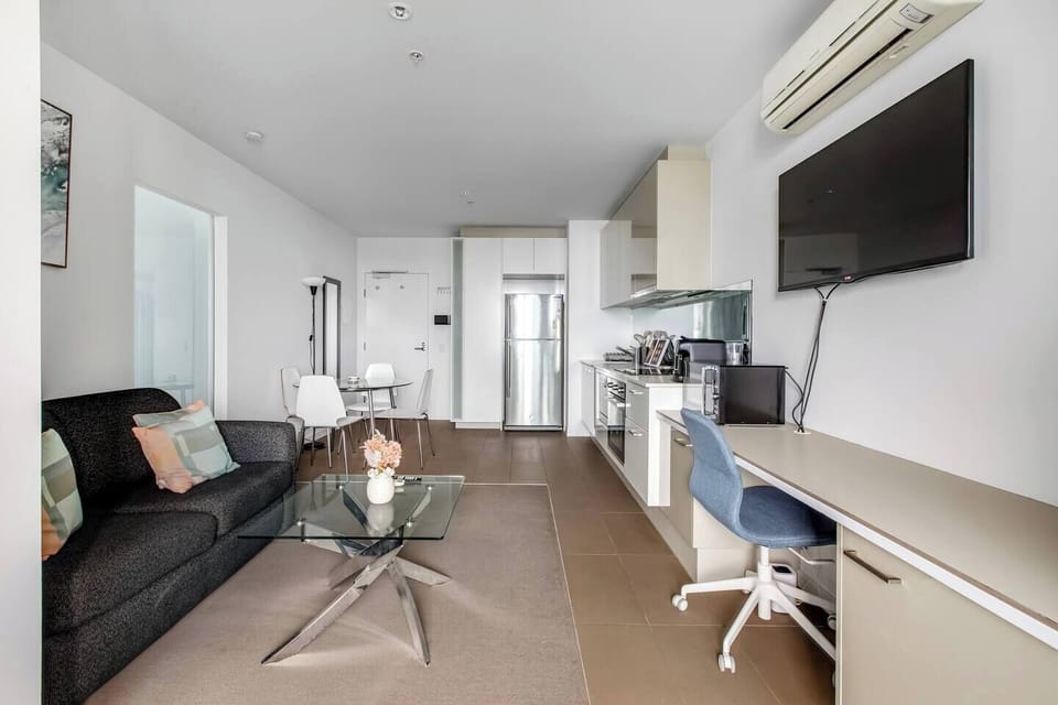 Make the most of the living room's desk for catching up on emails and work tasks.