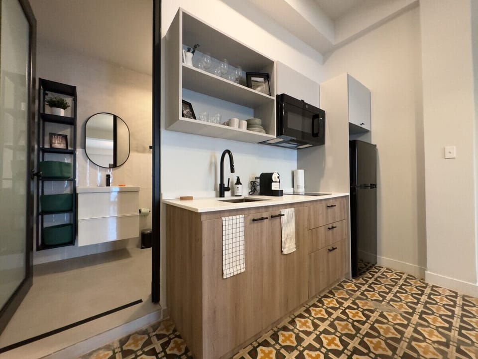 Equipped kitchen with refrigerator, stove, microwave, pots, pans, cutlery and equipped for 6.