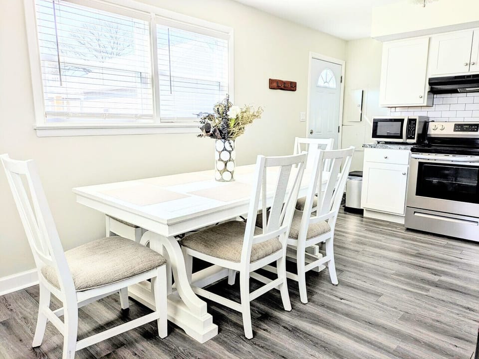 The large dining table comfortably seats 6.