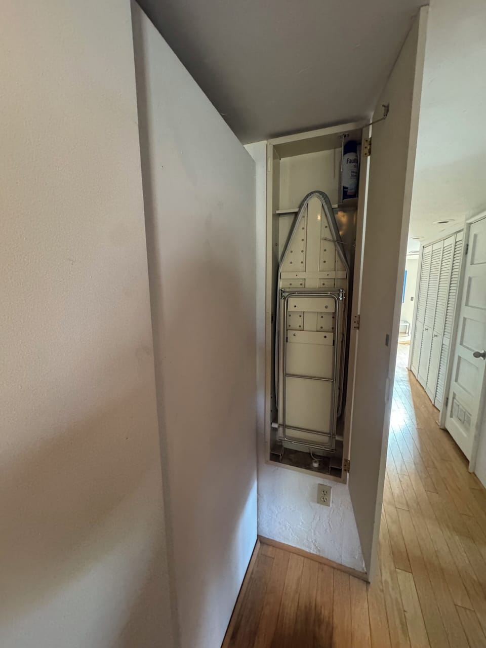 Ironing board with iron