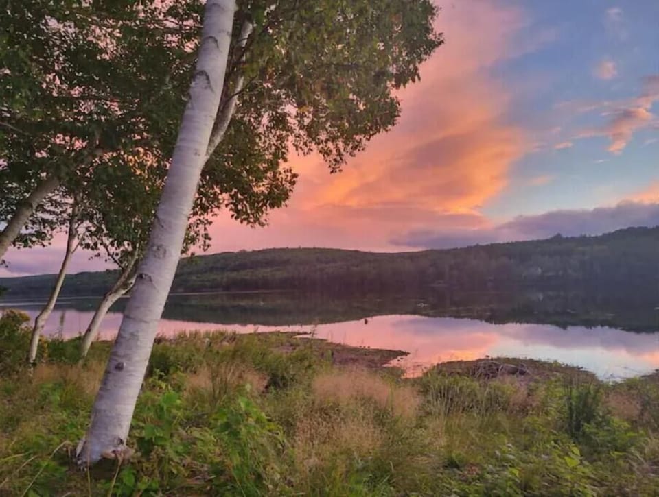 Beautiful view of a sunset sky over North River:  1.5 kms from lodge