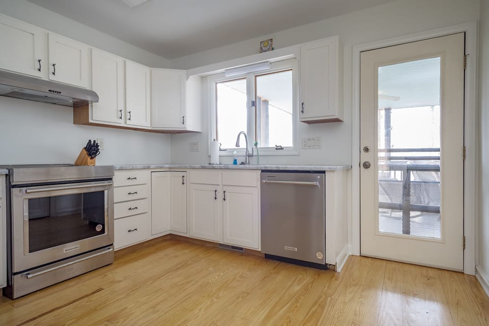 Kitchen with stainless appliances, dishwasher & Keurig coffeemaker.