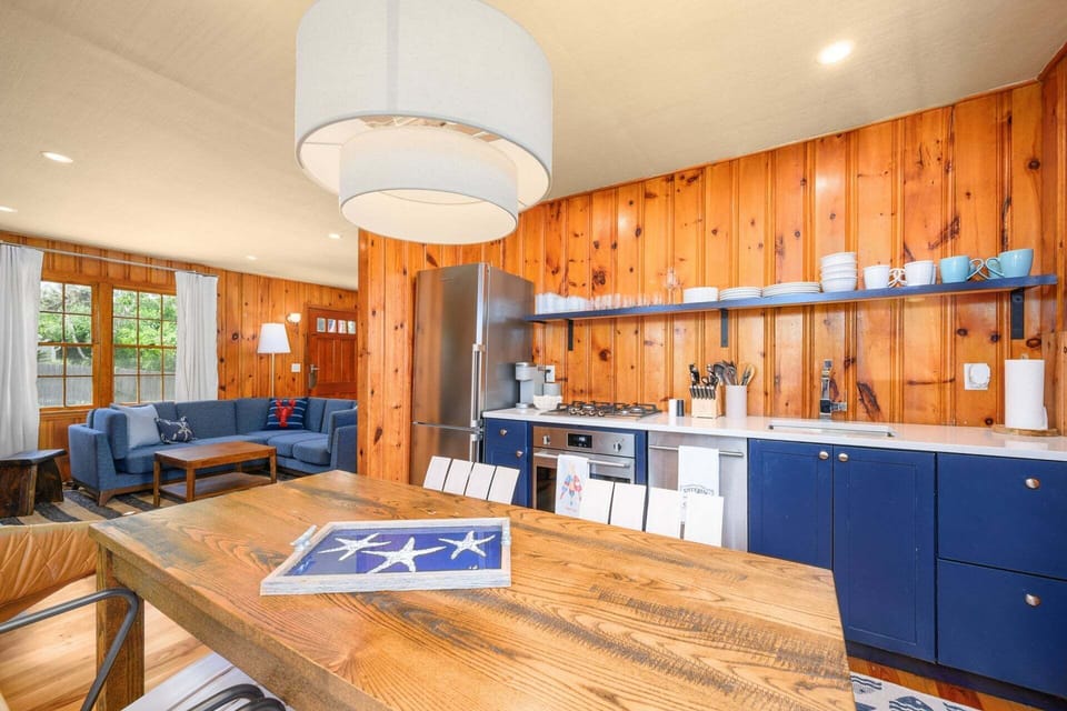 An angled view into the kitchen from outside the dining area