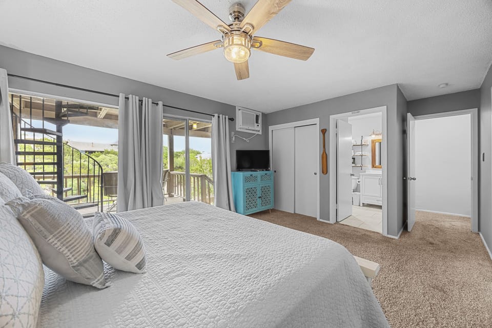 Downstairs primary bedroom has attached full bathroom.