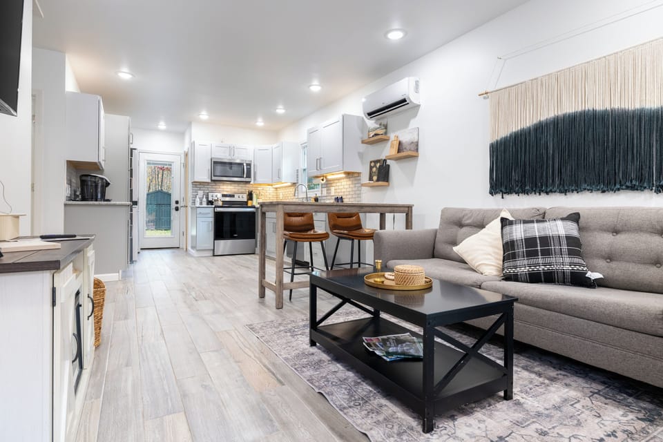Cozy living room with seamless connection to the kitchen.
