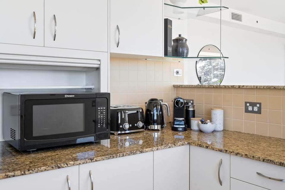 Microwave, Smeg Kettle & Toaster, Nespresso machine. Everything you need for the perfect start to your morning!
