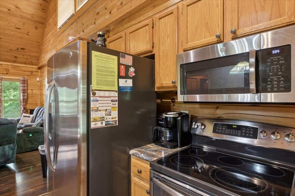 Discover culinary magic in this modern kitchen with sleek appliances and rustic charm!