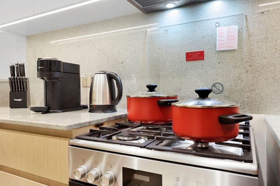 Gourmet Kitchen: Cook up culinary adventures with modern appliances and vibrant cookware!