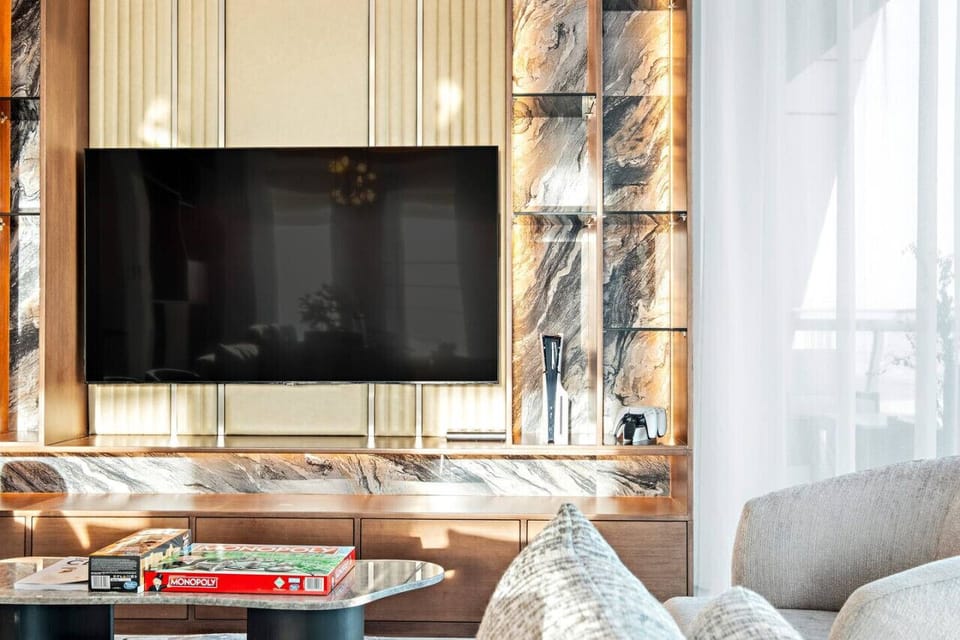 Living Room: Elegant decor and entertainment await in this stylish space for unforgettable moments!