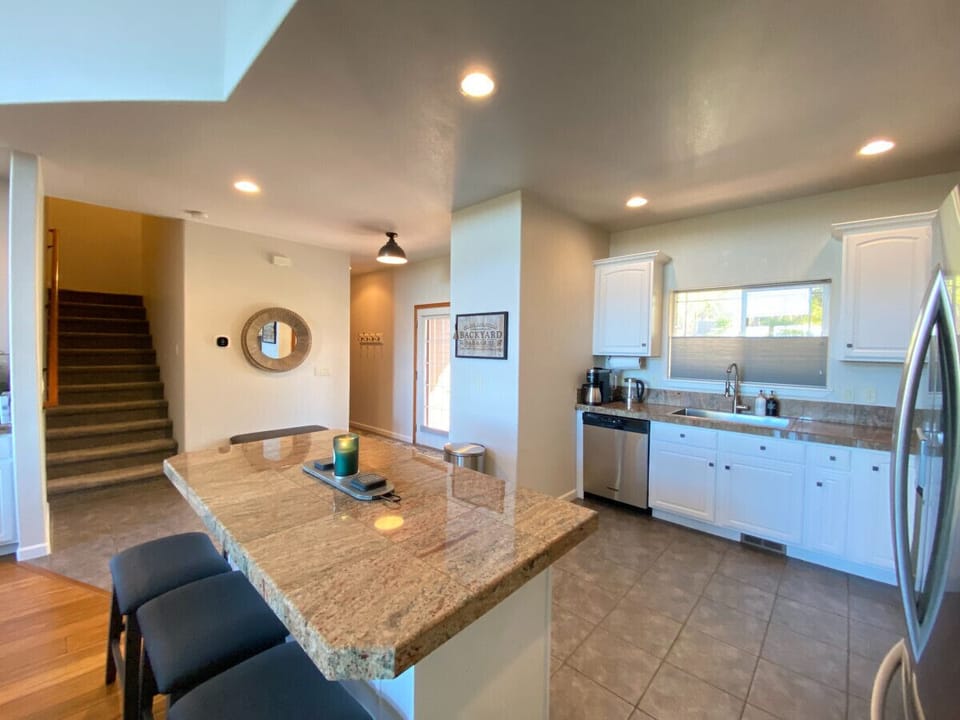 Kitchen/view of stairs to upper rooms