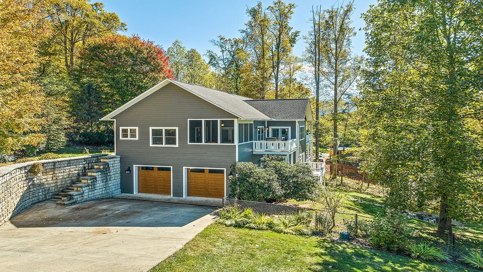 Spacious paved driveway can easily accommodate 3 vehicles.