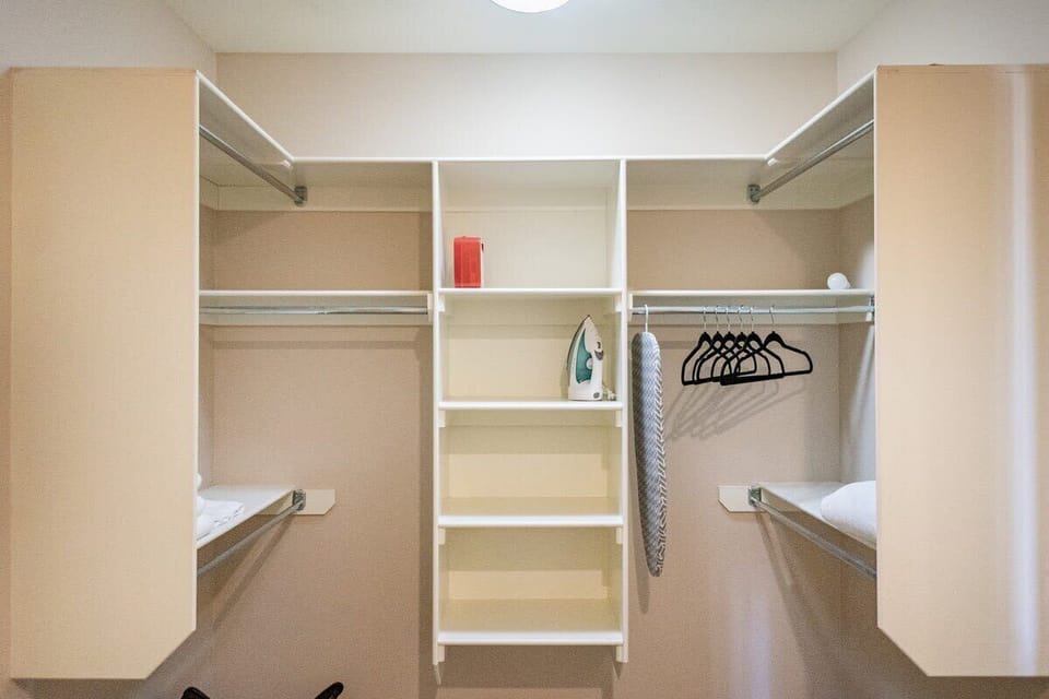 Elevate your space with our sleek white shelving unit, designed to seamlessly integrate into any room. 