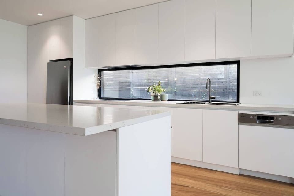 Premium appliances, including a dishwasher and Nespresso Coffee Pod machine, add to your convenience. 