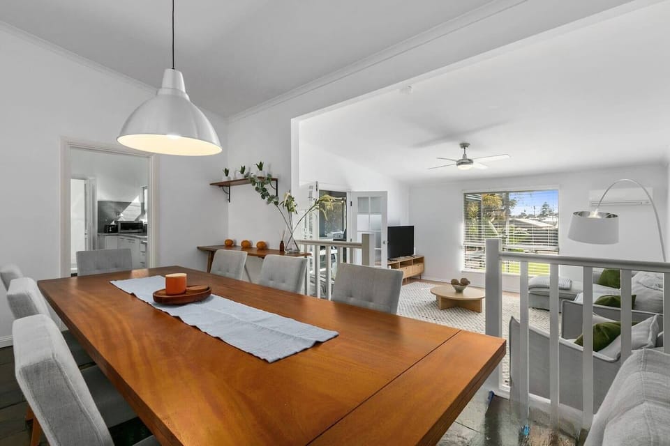 A large dining table makes it easy to share a meal at home or find shops and eateries close by.

