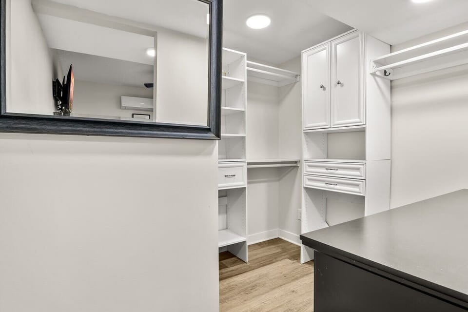 There is plenty of storage space in the closet for you to keep your items organized.