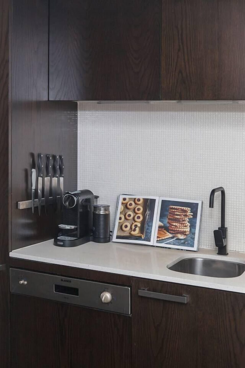 Brew your perfect morning pick-me-up with the sleek Nespresso coffee machine, right at your fingertips.