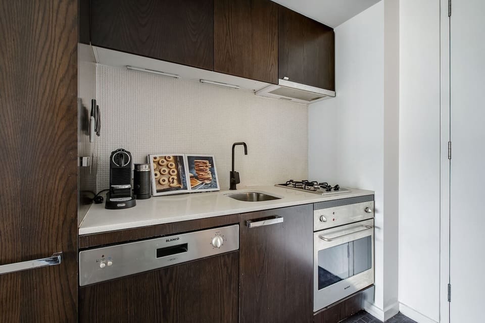 The modern, streamlined kitchen has all you need to cook meals and a dishwasher for easy clean-up.
