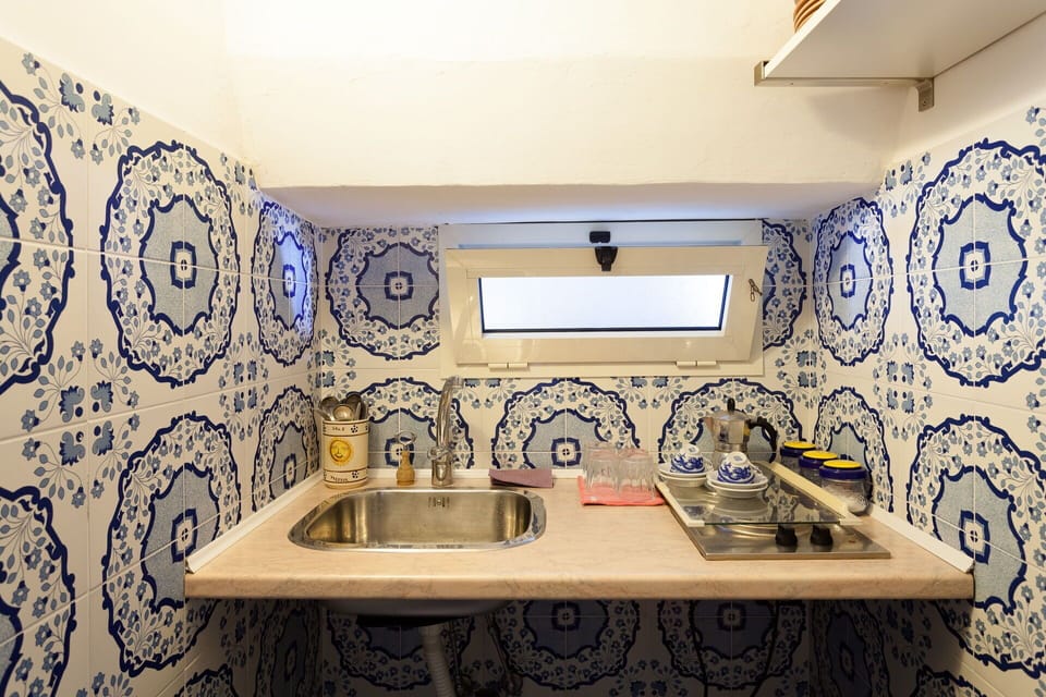 Tap, Plumbing Fixture, Property, Sink, Bathroom Sink, Building, Bathroom, Bathroom Cabinet, House, Purple