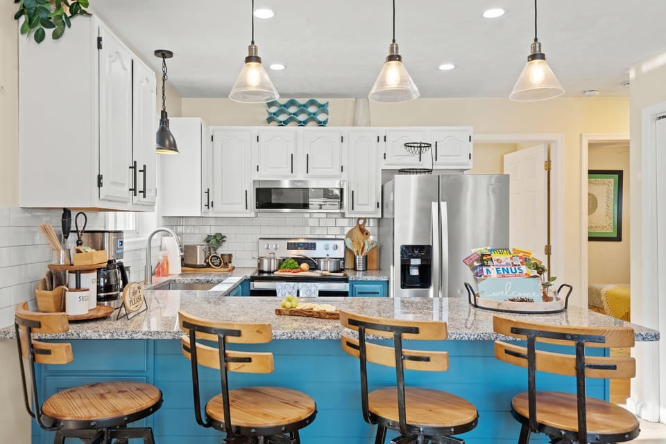 The fully equipped kitchen offers all the cooking and dining essentials.