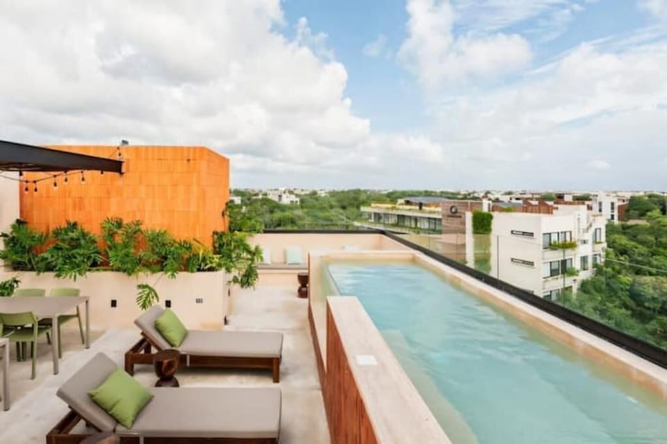 Rooftop pool with views overlooking Tulum
