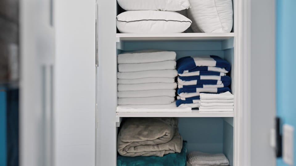 Bath towels, hand towels, beach towels, blankets and extra pillows. 