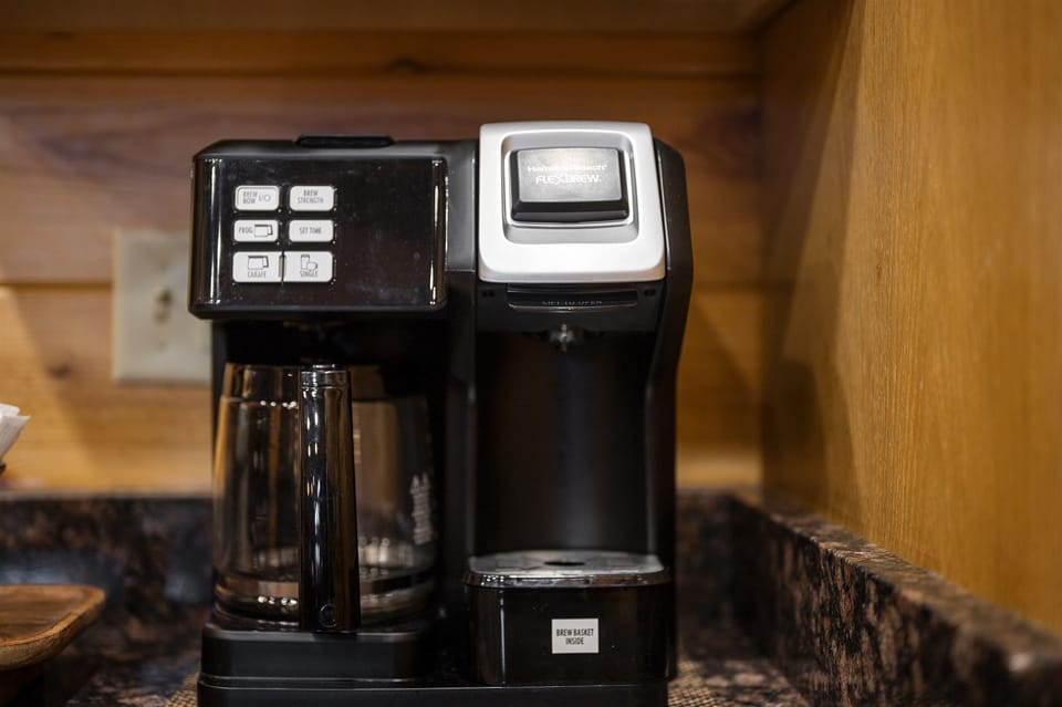 Wake up to the aroma of freshly brewed coffee from the dual-function coffee maker, perfect for guests needing a cup of Joe to start their day exploring Hochatown. Coffee included.