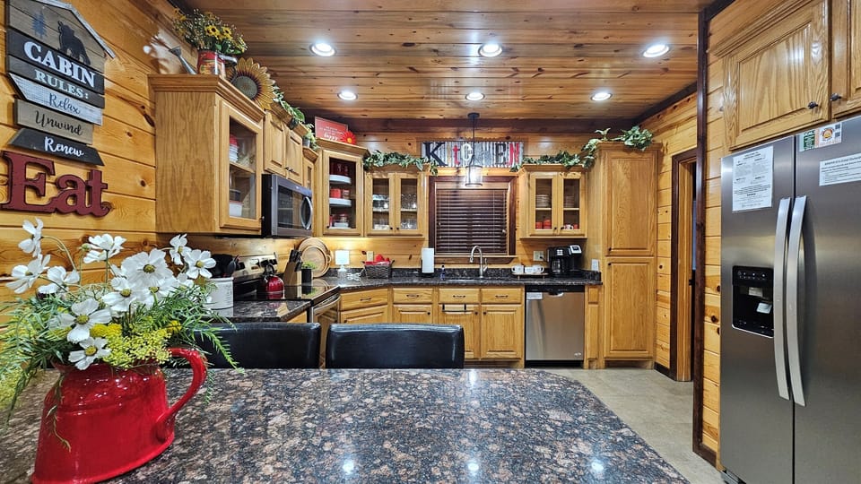 From stovetop to table, this kitchen setup makes it easy to prepare and serve meals without missing a beat. Cook up a hearty breakfast, gourmet dinner, or late-night snack and enjoy it together at this custom table made for eight!