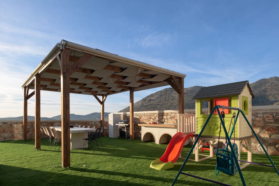 Complimented with ideal BBQ settings & a playground for our little guests.
