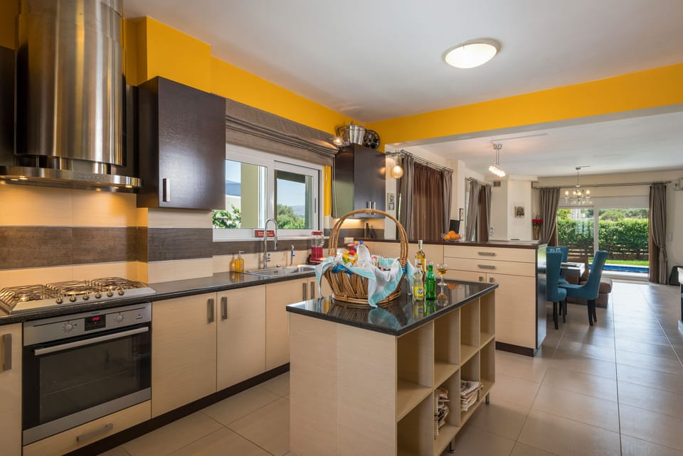 The bright kitchen offers the necessary cooking equipment