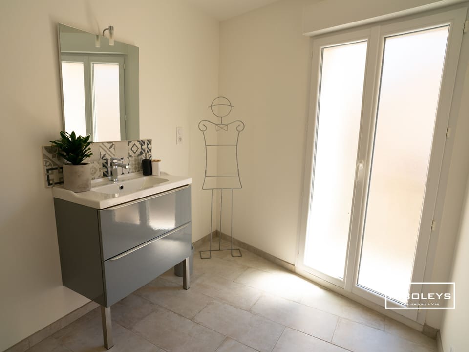 Large bathroom with shower and dressing room