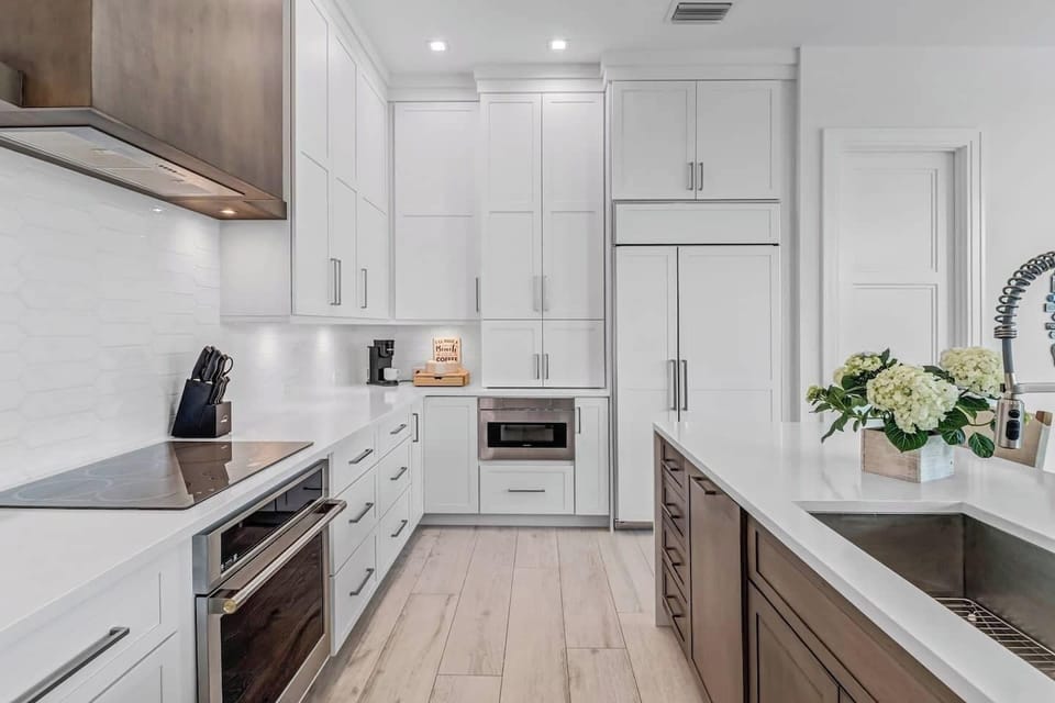 Fully stocked Chef's Kitchen with quartz countertops for preparing a gourmet meal