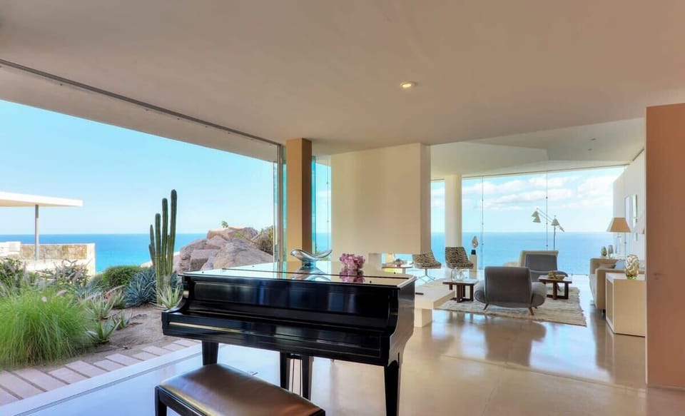 Can someone in the group play? The baby grand is a unique feature we love in the home.