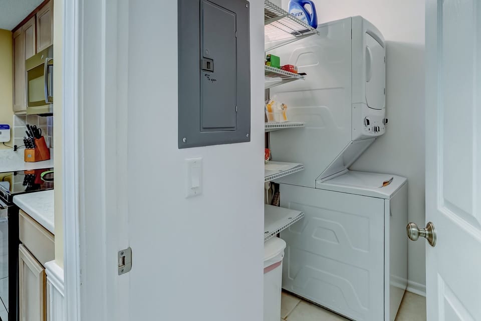 Separate laundry area with pantry space for long stays 