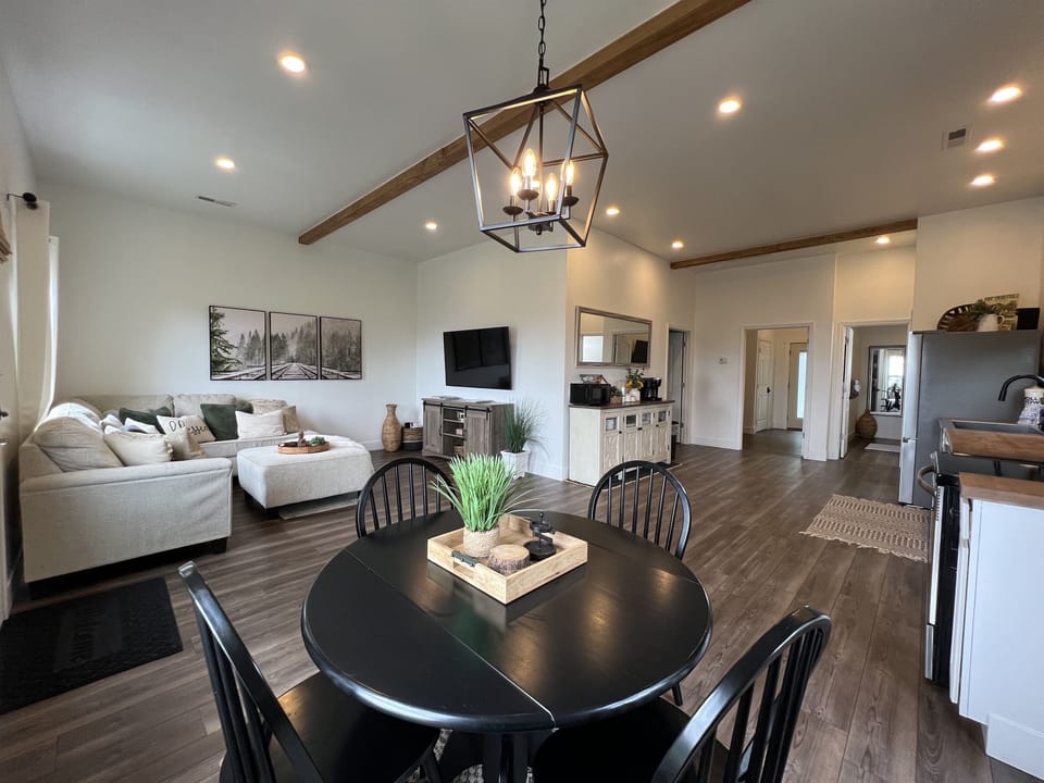 Dining area, living room, and kitchen area