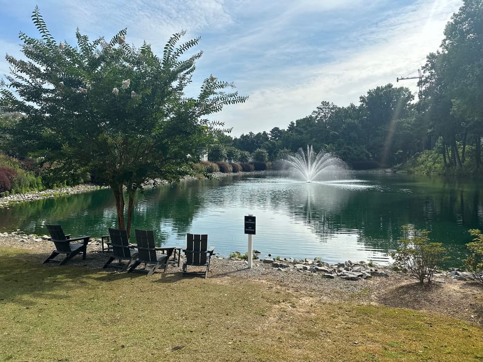 Relaxing pond area across the apartment building