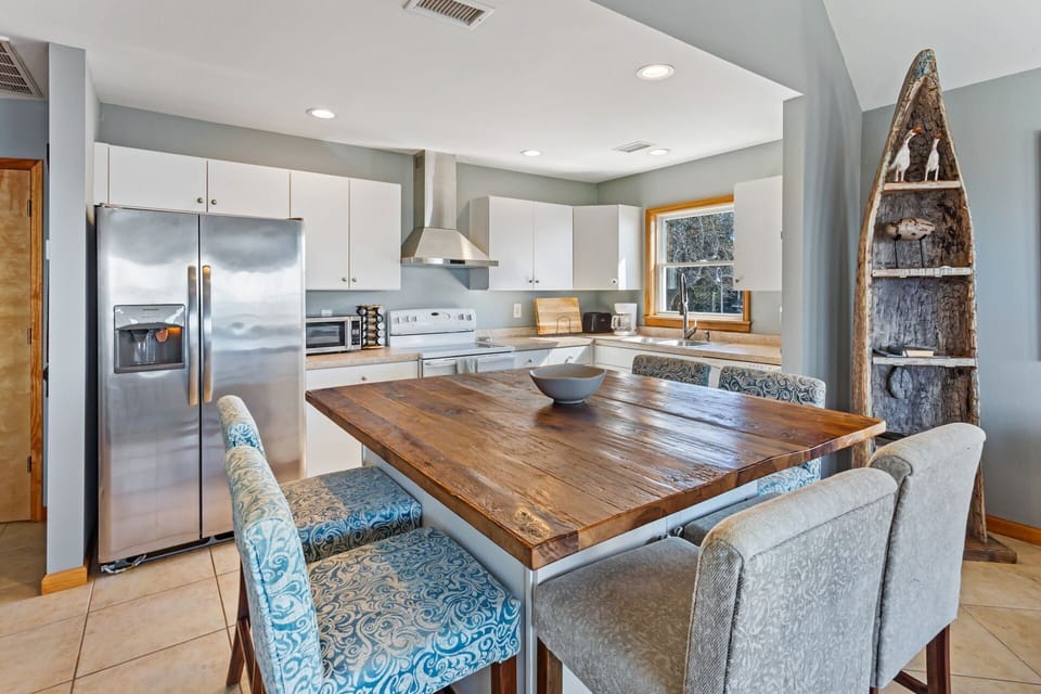 Whip up something delicious in the open-concept Kitchen and Dining Area.