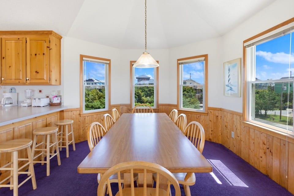 Dining Area: Coastal-inspired Dining Area where the whole family can enjoy meals together.